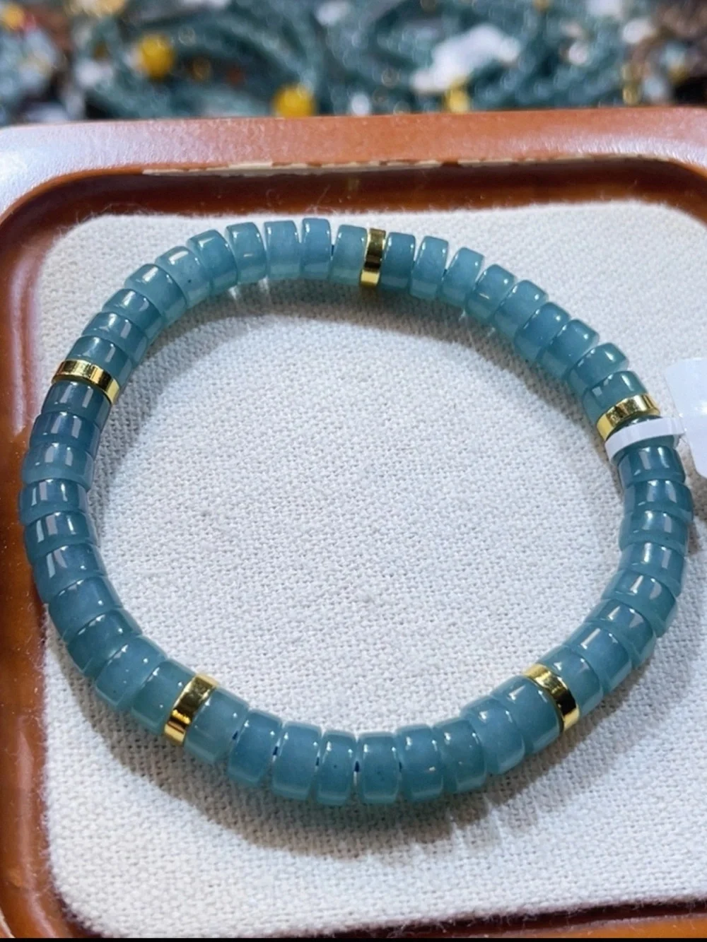 Elegant Blue Water Beaded Stretch Bracelet with Gold Accents